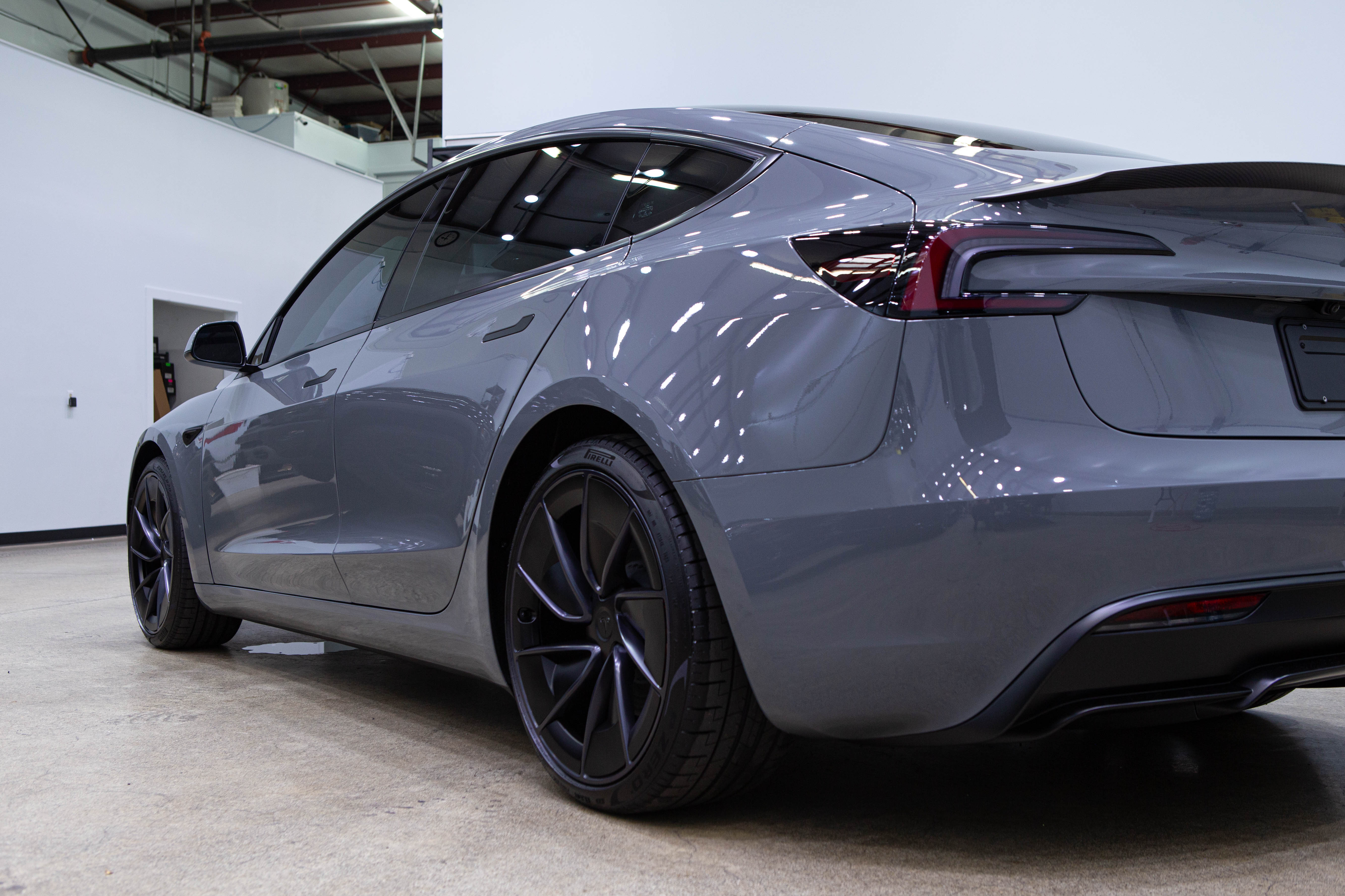 Protected grey sedan in the studio