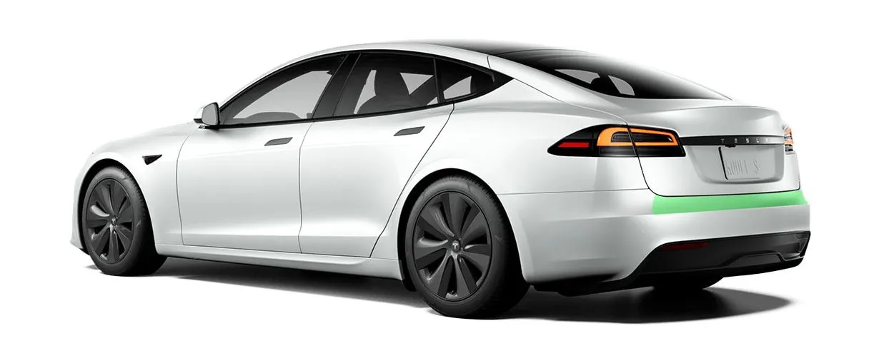 Rear bumper top coverage highlighted on a Tesla Model S